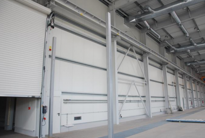 CONSTRUCTION OF A MODERN PAINT SHOP AND A NEW OFFICE BUILDING